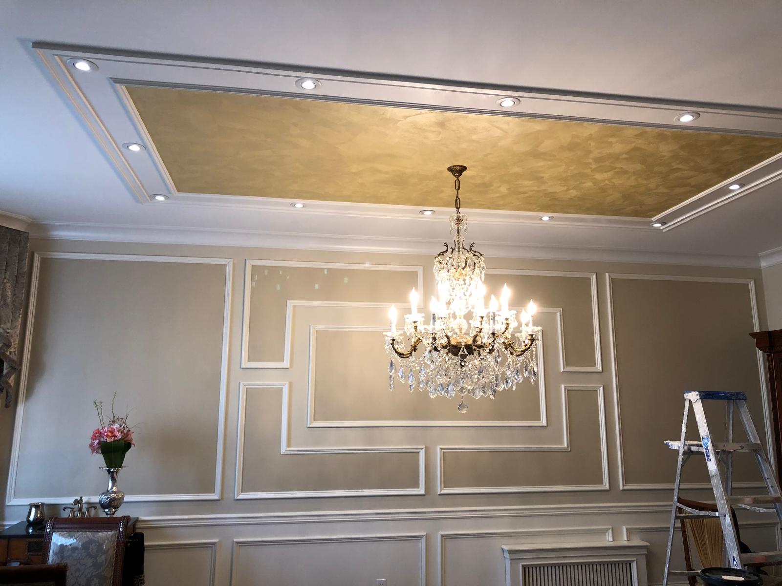 Modern living room in Brooklyn with freshly painted white walls and warm ambient lighting